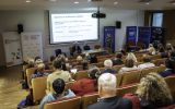Widok na salę i prelegentów podczas jednego z paneli Kongresu.